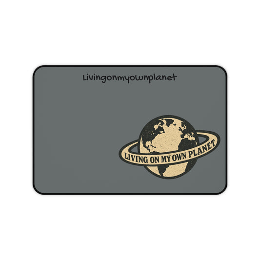 Living on My Own Planet Desk Mat